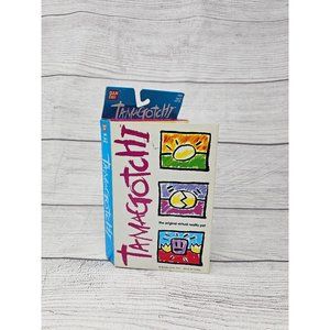 Original 1997 Tamagotchi #1800‎ Gold, Black Buttons, Original Box